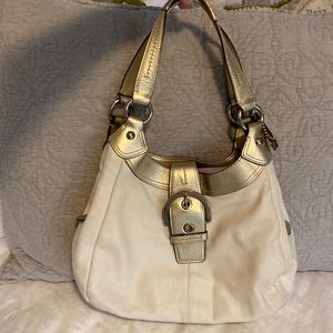 Coach Soho Hobo Leather White, Gold Metallic w/purple interior. 3 int sectns
